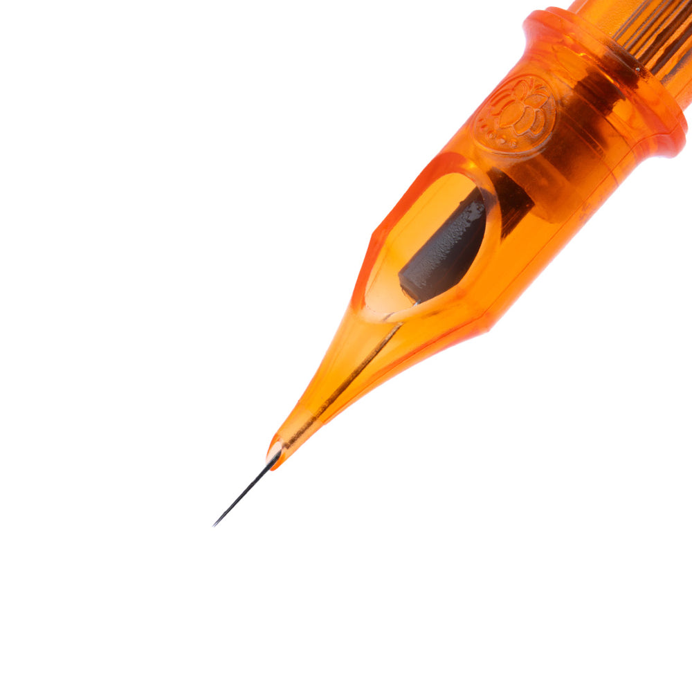 Close-up of an orange tattoo needle cartridge on a white background