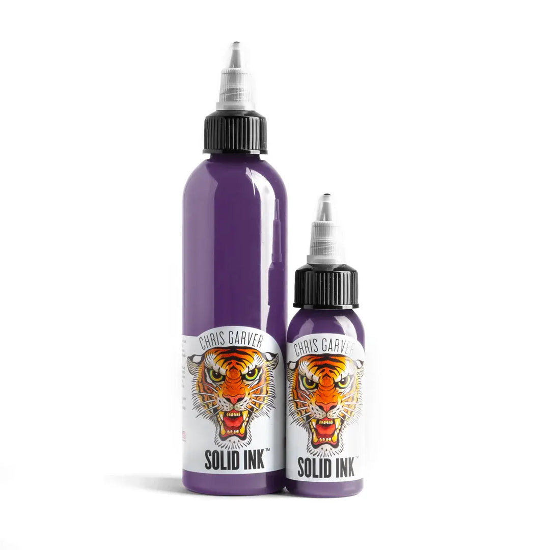 Two bottles of Chris Garver Solid Ink on a white background