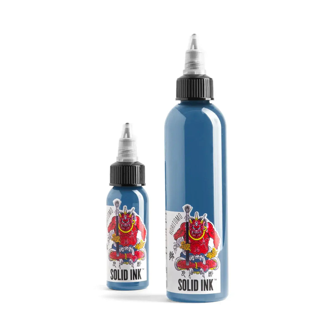 Two bottles of Solid Ink on a white background